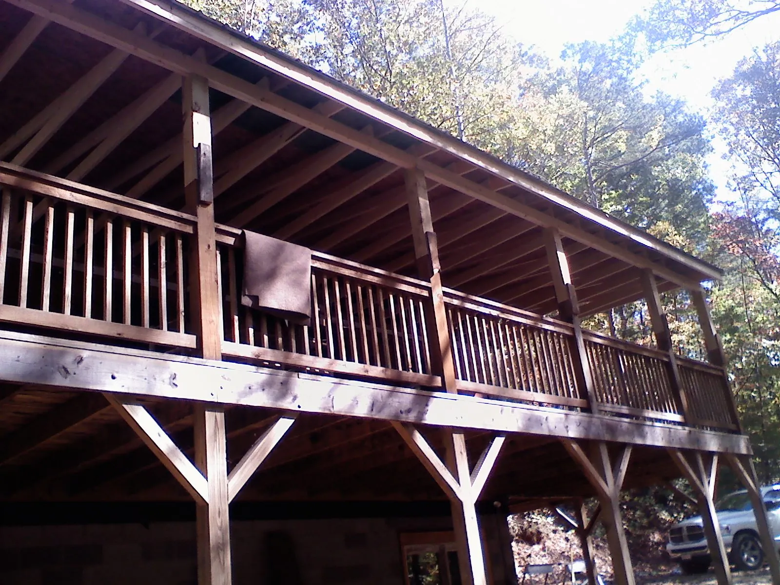 Timber framing under a new elevated porch and deck — Roof Leak Repair in Reed Point by Roofing Brothers